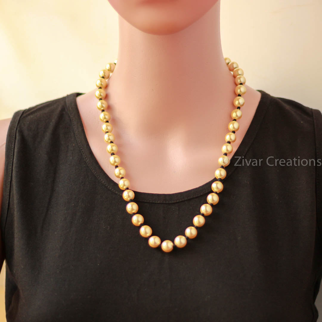 Black thread pearl necklace
